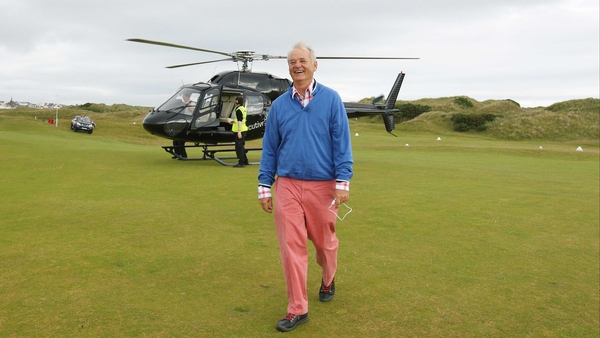 Bill Murray arrives by helicopter for the curtain-raising pro-am