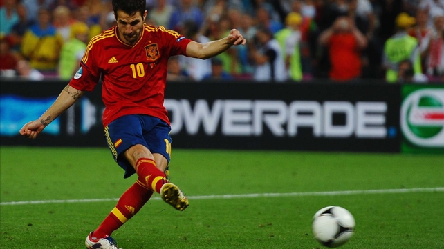 Cesc Fabregas converts the winning penalty