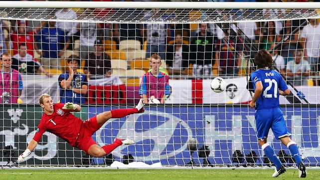 Italy's Andrea Pirlo dinks the ball over England's Joe Hart in a quarter-final penalty shootout at Euro 2012