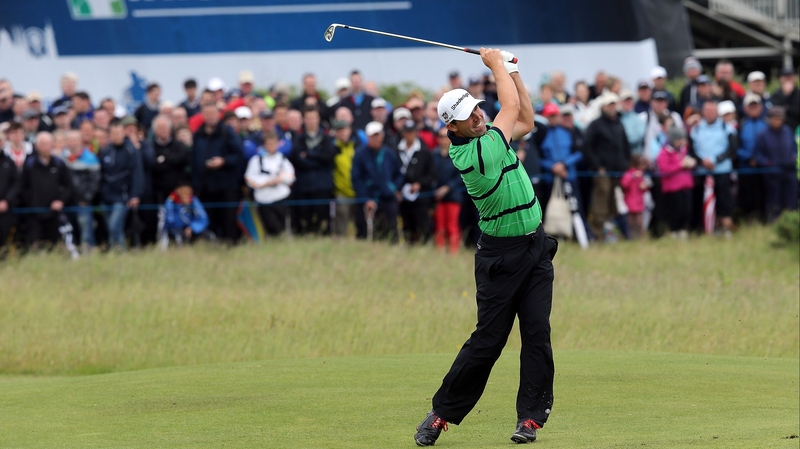 Pádraig Harrington plays his second shot on the first hole today