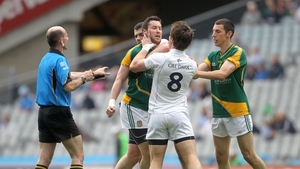 Emmet Bolton of Kildare confronts Meath's Cian Ward