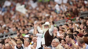 A Kildare supporter gets excited by a first-half point for the Lilywhites