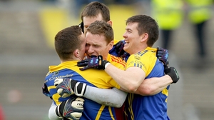 Roscommon's Seanie McDermott, Niall Carty and Sean Purcell celebrate with goalkeeper Geoffrey Claffey at the final whistle at Dr Hyde Park