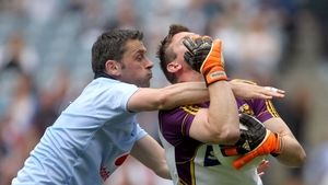 Dublin's Alan Brogan comes in high on Wexford goalkeeper Anthony Masterson