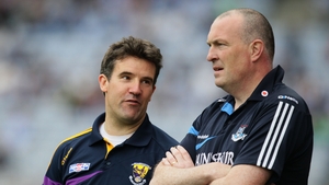 Wexford manager Jason Ryan (l) shares a word with his Dublin counterpart Pat Gilroy