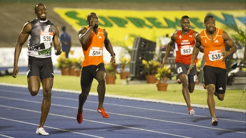 Yohan Blake (r) won the 200m Jamaican National Championships, beating Usain Bolt (l)