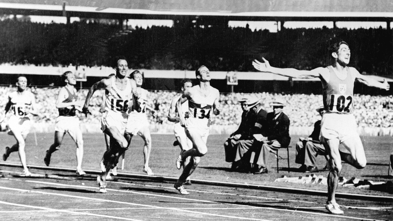 Ronnie Delany crosses the line first to claim gold in the 1956 Olympics 1500m final