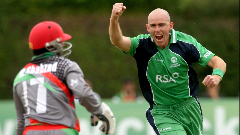 Ireland's Trent Johnston celebrates the wicket of Mohammad Shahzad of Afghanistan caught by William Porterfield