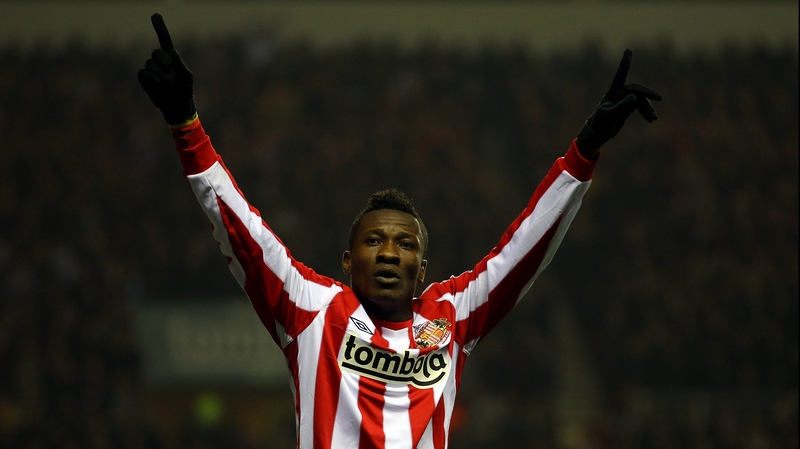 Asamoah Gyan enjoys a rare bright moment during his time in a Sunderland jersey