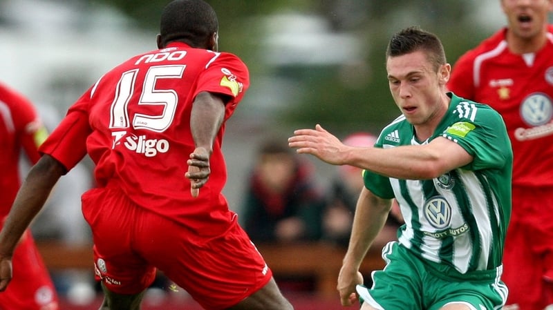 Bray's John Mulroy is closed down by Joseph Ndo of Sligo