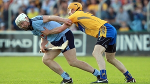 Dublin forward Liam Rushe attempts to escape the clutches of Cian Dillon