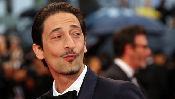 Adrien Brody plays Houdini