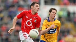Cork's Donncha O'Connor is pursued by Kevin Harnett