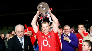 Cork captain Michael Shields holds the Munster trophy aloft