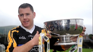 Antrim's captain and goalkeeper Damian Quinn poses with the Ulster cup