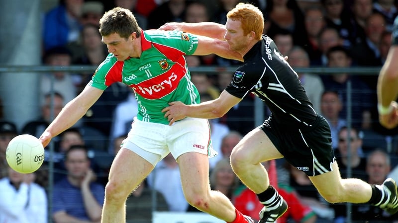 Seamus O'Shea of Mayo is tackled by Sligo's Ross Donovan during the 2010 Connacht quarter-final clash which the Yeats county won