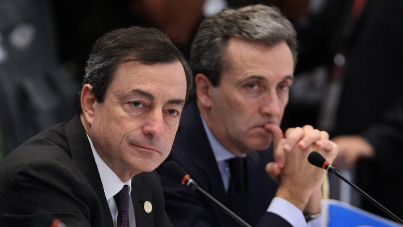 Mario Draghi pictured with Vittorio Grilli, right, when they were Italy's central bank governor and deputy