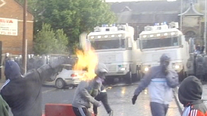 Petrol bombs have been thrown at riot police