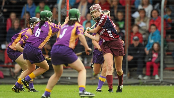 Aislinn Connolly gets her strike away under pressure from three Wexford players