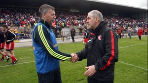 Roscommon Des Newton shakes hands with his Tyrone counterpart after the game
