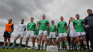The Limerick footballers stand to attention for the national anthem at Pearse Park in Longford