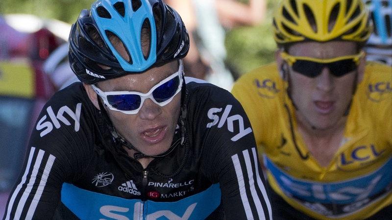 Chris Froome (l) feels the support he must give team leader Bradley Wiggins (r) is a 'very, very great sacrifice'.
