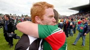 Mayo captain Andy Moran (r) consoles his Sligo counterpart Ross Donovan