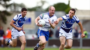 Monaghan midfielder Dick Clerkin attempts to pass John O'Loughlin of Laois