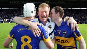 Tipperary manager Declan Ryan (centre) with Brendan Maher (l) and Lar Corbett (r) after the game