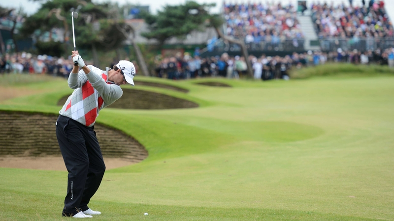 Adam Scott hits a shot on the 13th hole during his fine opening round