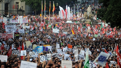Thousands of people protest against the Spanish government's latest austerity measures in Madrid