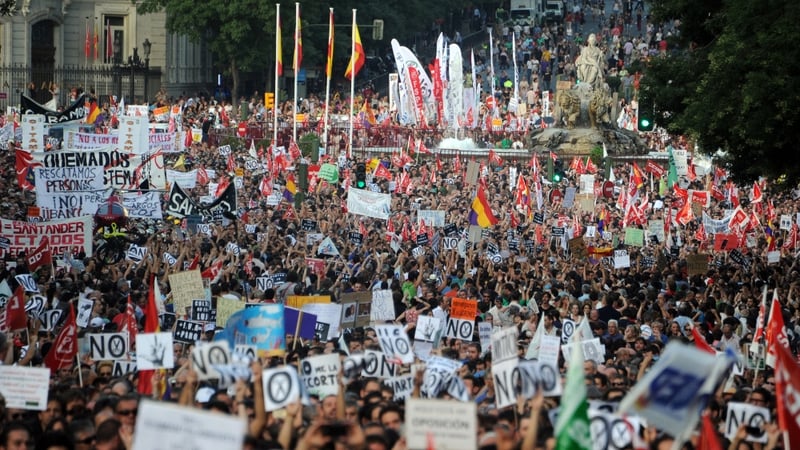 Thousands of people protest against the Spanish government's latest austerity measures in Madrid