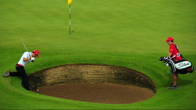 Rafael Cabrera-Bello gets creative with one of many bunkers dotted throughout The Open venue