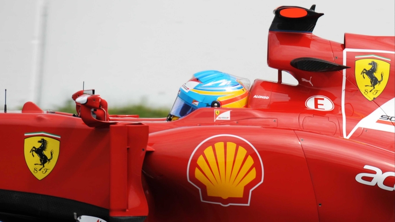 Fernando Alonso coped best with the wet conditions to take pole in the German Grand Prix