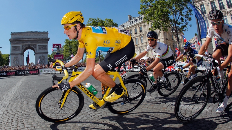 Bradley Wiggins rounds the Arc d'Triomphe on his way to winning the 2012 Tour de France