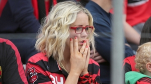 A Down fan takes in her side's loss
