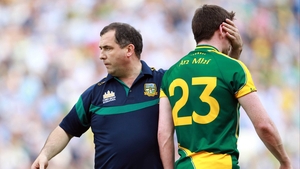 Meath manager Seamus McEnaney consoles a dejected Peadar Byrne at the end of the game
