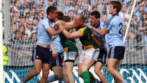 James McCarthy, Michael Fitzsimons and Rory O'Carroll of Dublin exchange pleasantries with Joe Sheridan