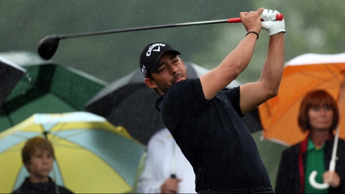 Pablo Larrazabal tees off in the rain in Austria