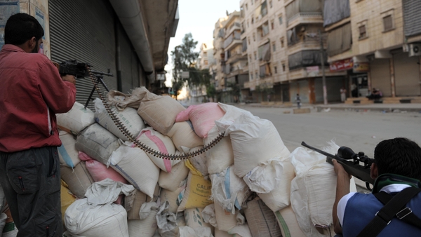 Syrian armed forces and rebels are battling for control of the country's main industrial hub