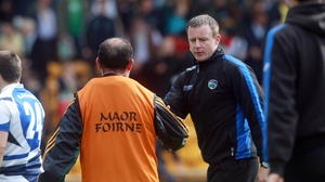 McEnaney shakes hands with Laois manager Justin McNulty at the end of the game