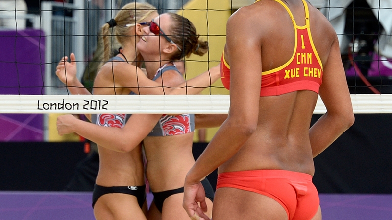 Anastasia Vasina and Anna Vozakova celebrate victory over Zhang Xi and Xue Chen