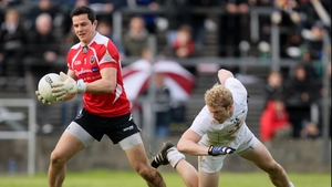 Sligo goalkeeper Philip Greene slips past Tomás O'Connor of Kildare at Dr Hyde Park