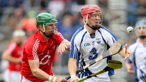 Cork's Brian Murphy chases down John Mullane of Waterford