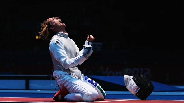Valentina Vezzali celebrates winning her Women's Foil Individual Fencing Quaterfinal match against Ines Boubakri of Tunisia