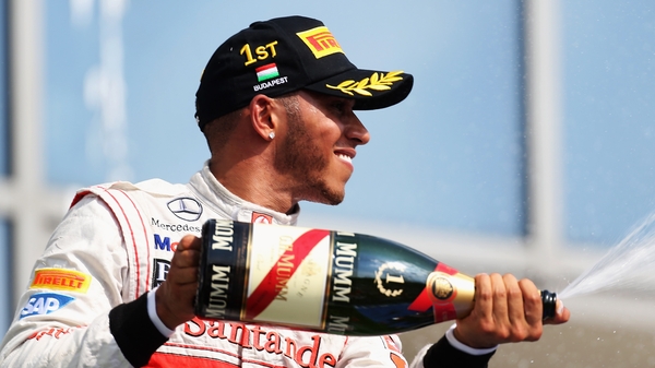 Lewis Hamilton celebrates his win in Hungary