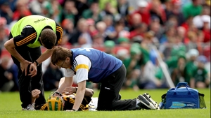 Kilkenny's Richie Power is laid out after being on the receiving end of a shuddering Wayne McNamara shoulder