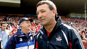 There were contrasting emotions for Waterford manager Michael Ryan (l) and his Cork counterpart Jimmy Barry-Murphy at the final whistle