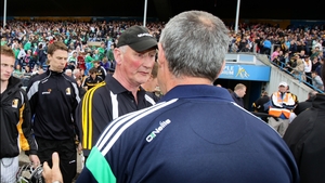Cody shakes hands with Limerick boss John Allen after the final whistle went to confirm Kilkenny's 4-16 to 1-16 victory