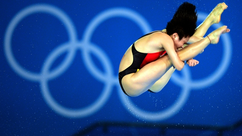 China's Chen Ruolin and Wang Hao compete in the synchronised 10m platform final